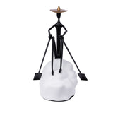 Man Sailing on boat sculpture